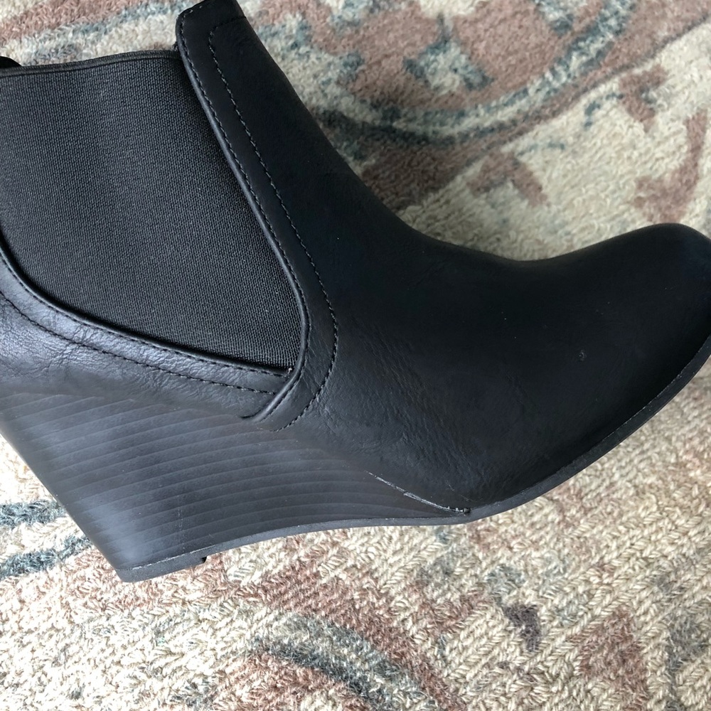 Like new back wedged shoes. ONLY WORN ONCE.